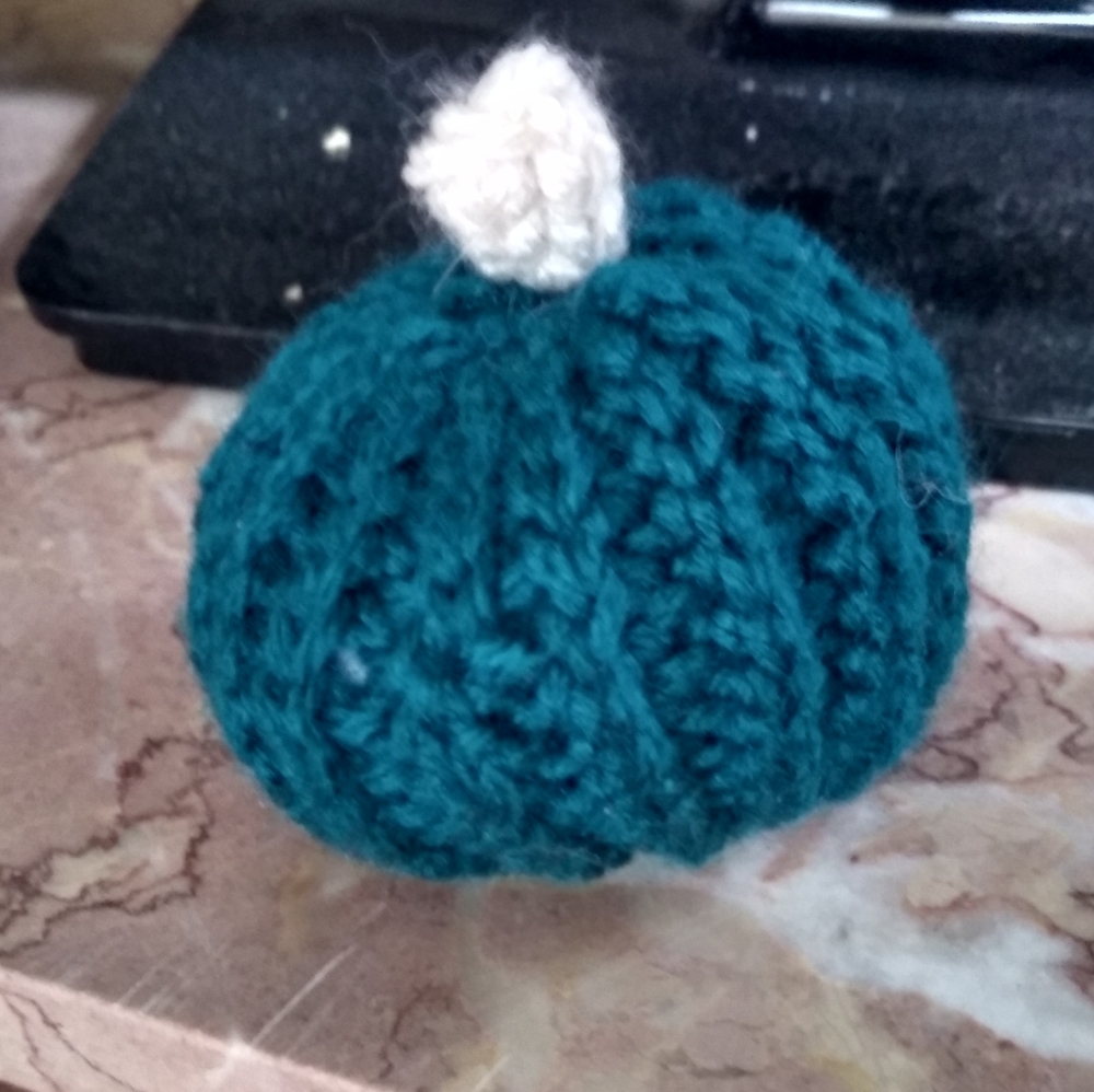 Dark teal crocheted pumpkin